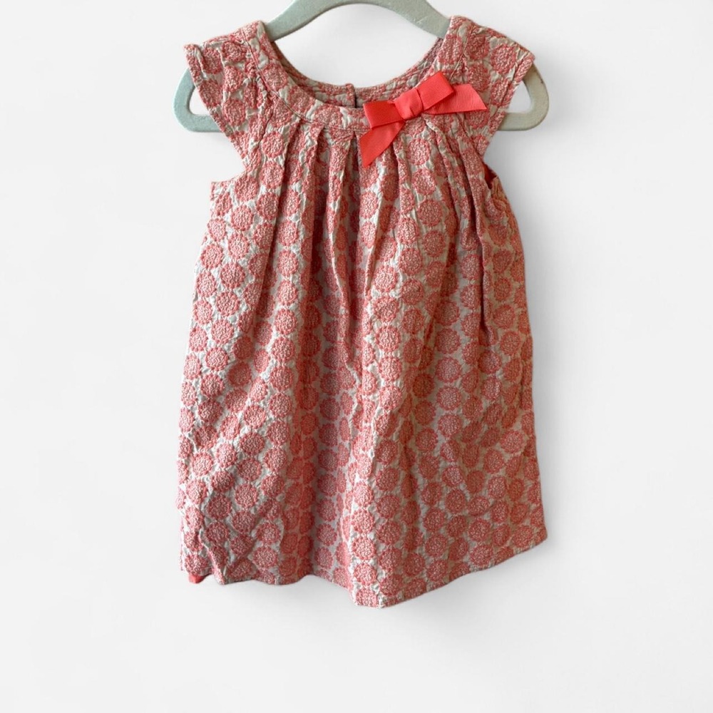 Cherokee peach babydoll floral embroidered dress with bow detail. Size: 2T